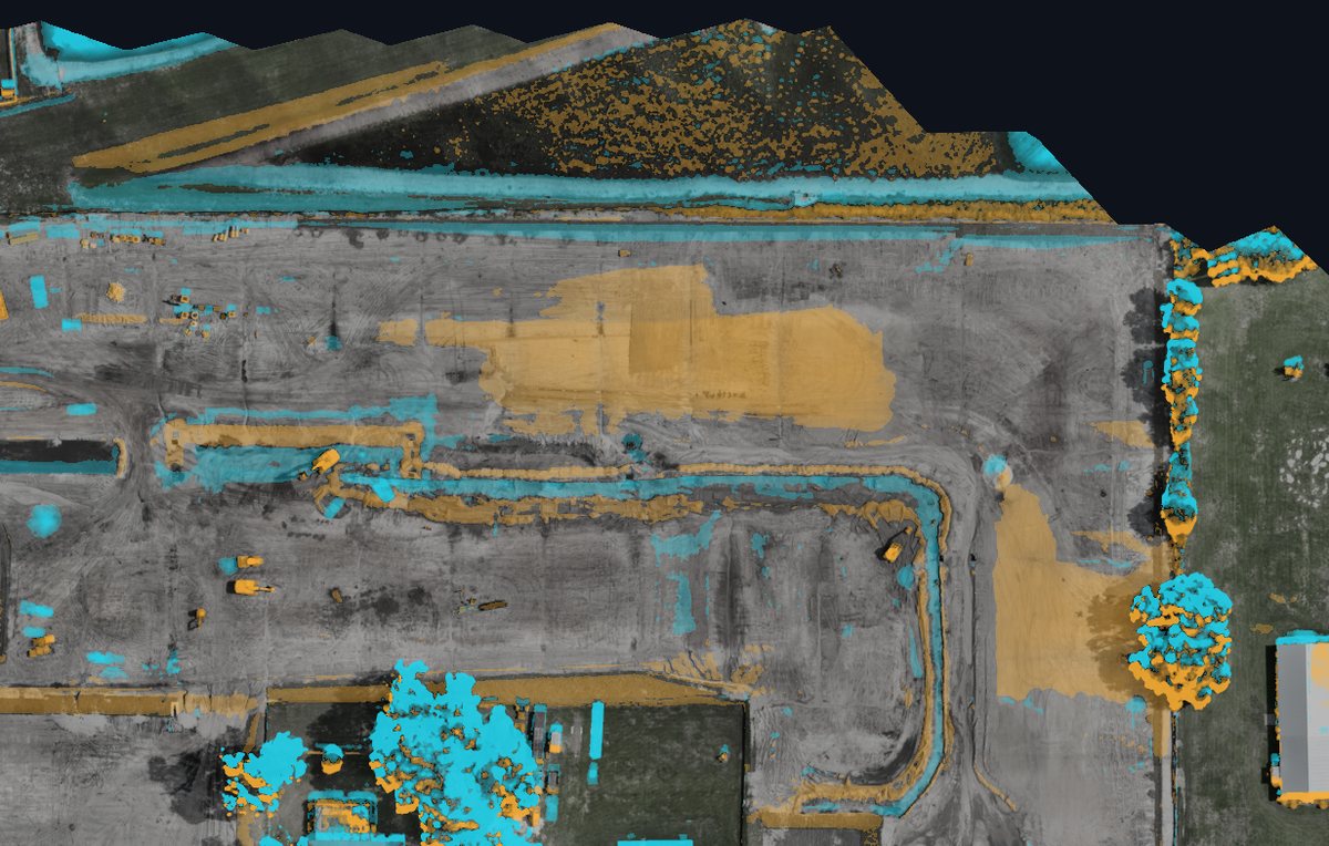 Change-detection map over an orthomosaic: an amber graded pad and amber road base along a curved street, cyan on tree canopy, and a largely unchanged grey site interior